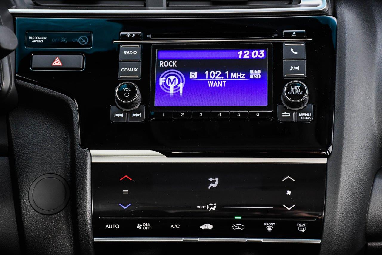 Rádio e ar-condicionado do Fit