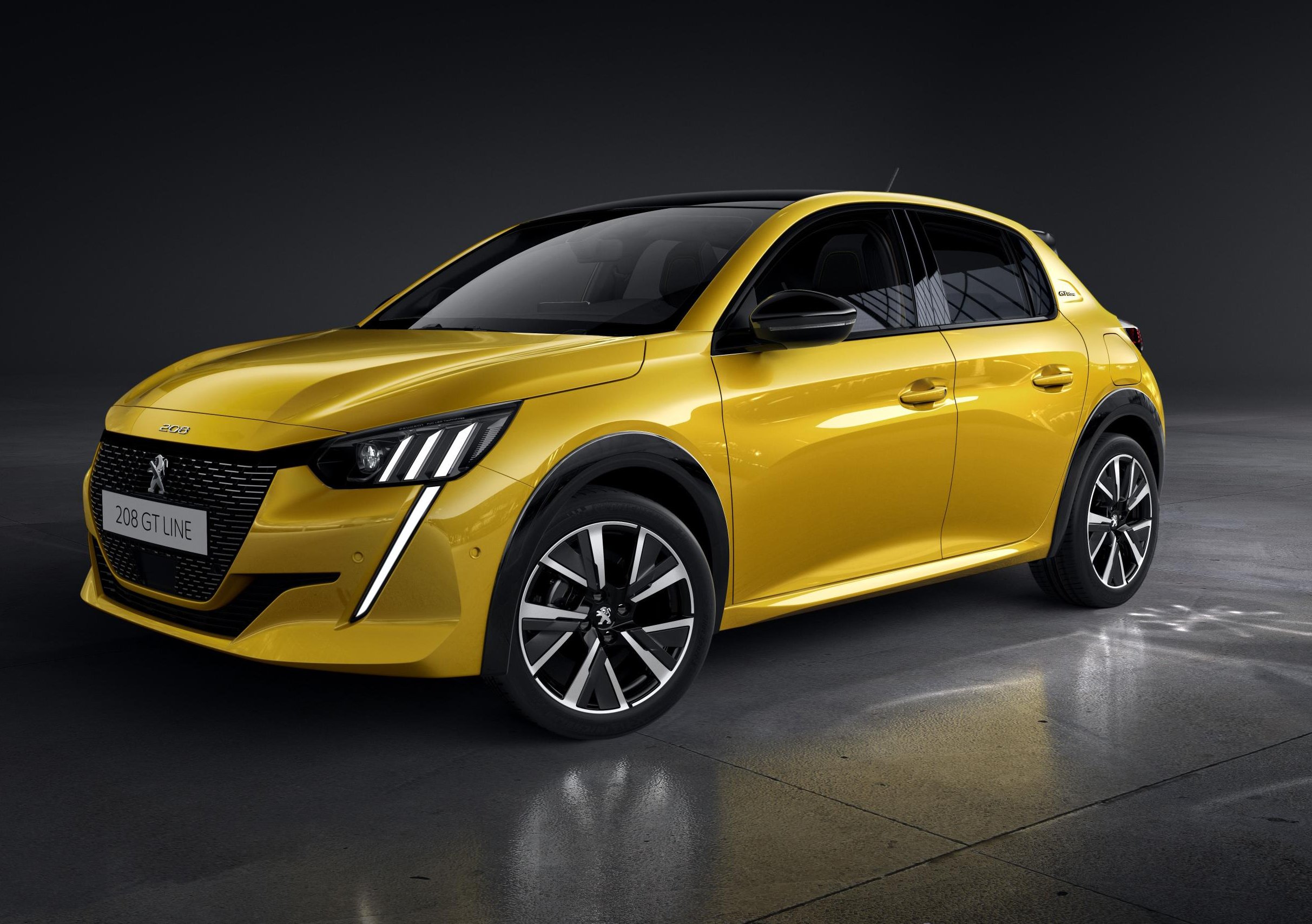 Novo Peugeot 208 amarelo europeu tem faróis com três seções de luzes