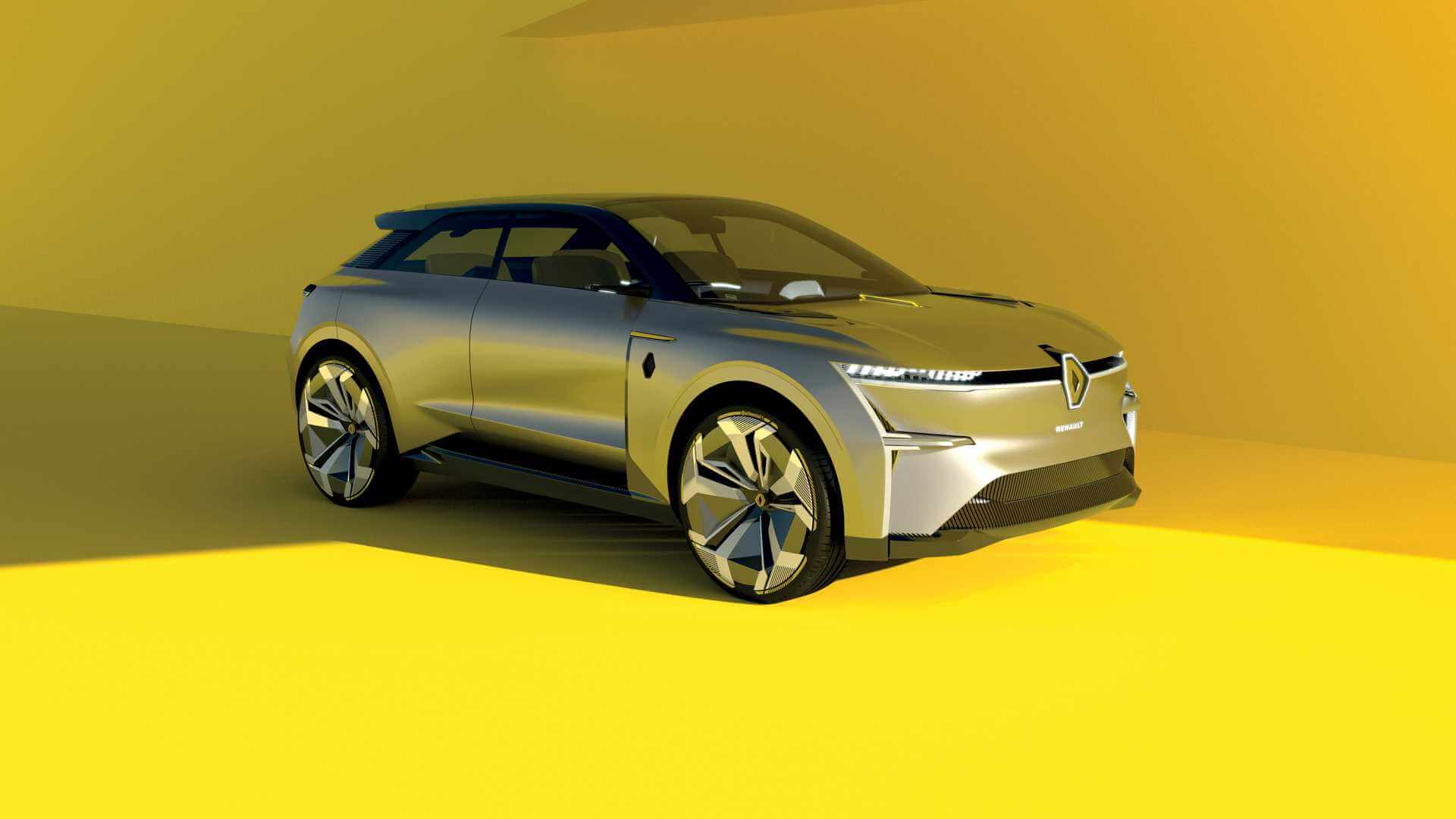 Renault Morphoz Concept dourado de perfil à meia sombra em um ambiente todo amarelo