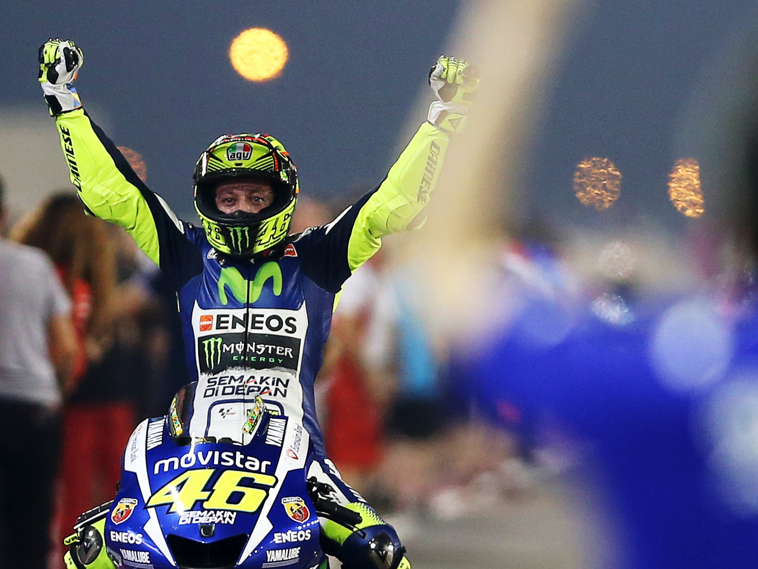 Yamaha Motogp Rider Valentino Rossi Of Italy Celebrates After Crossing The Finish Line Of The Qatar Motogp Grand Prix At The Losail International Circuit In Doha