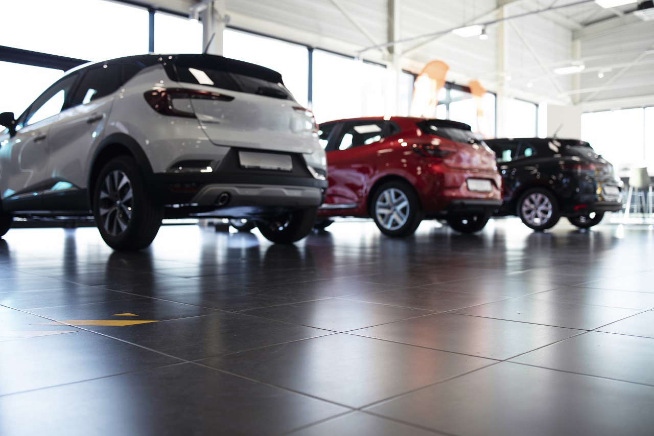 Car Dealership Showroom With Vehicles For Sale. Modern Car Purchase.